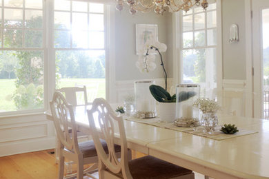 Photo of a farmhouse dining room in Raleigh.