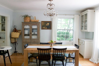 Example of a country dining room design in Kansas City