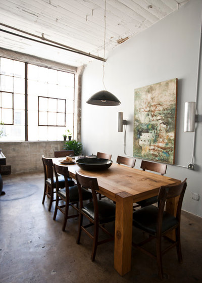 Industrial Dining Room by Chris Dorsey Architects, Inc
