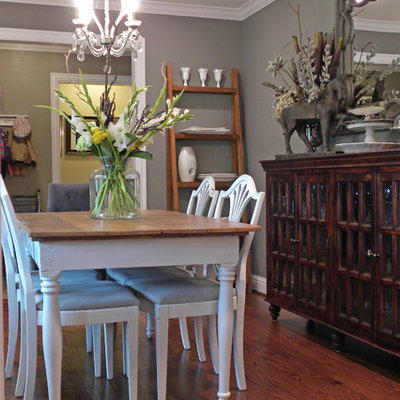 Inspiration for an eclectic dark wood floor dining room remodel in Dallas with gray walls