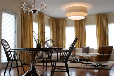 Dining room - eclectic dark wood floor dining room idea in Chicago with beige walls