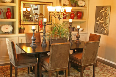 Example of a mid-sized transitional dark wood floor and brown floor enclosed dining room design in New York with beige walls and no fireplace