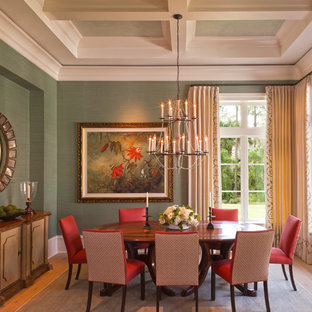 Enclosed dining room - traditional medium tone wood floor enclosed dining room idea in Boston with green walls and no fireplace