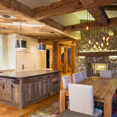 Kitchen/dining room combo - small country light wood floor kitchen/dining room combo idea in Minneapolis with beige walls and no fireplace