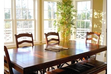 Kitchen/dining room combo - large traditional carpeted kitchen/dining room combo idea in Seattle with yellow walls
