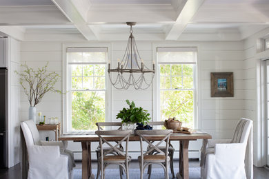 This is an example of a nautical dining room in Other.