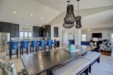 Inspiration for a large coastal dining room remodel in Other