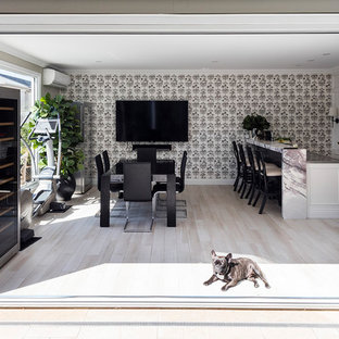 Contemporary dining room in Brisbane with beige walls, light hardwood floors, no fireplace and brown floor.