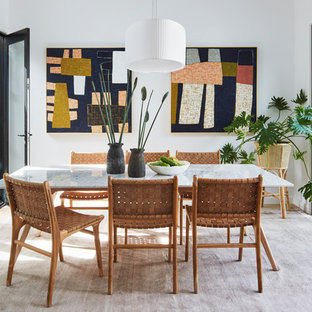 Inspiration for a contemporary dining room in Melbourne with white walls, light hardwood floors and no fireplace.