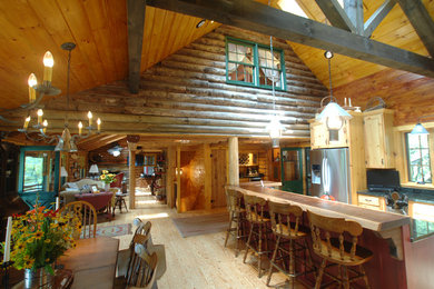 Example of a mountain style dining room design in Orlando