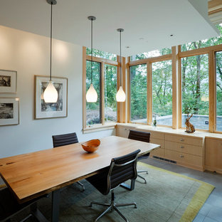 Idee per una sala da pranzo aperta verso la cucina contemporanea con pareti bianche, pavimento in gres porcellanato e nessun camino