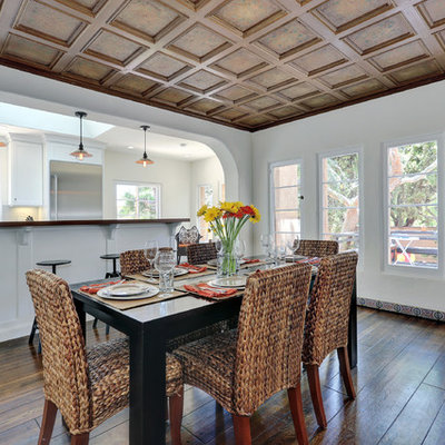 Mid-sized tuscan dark wood floor and brown floor kitchen/dining room combo photo in Los Angeles with white walls and no fireplace