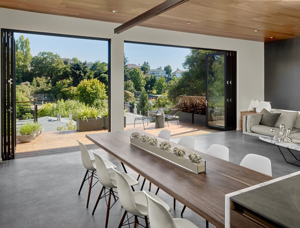 Midcentury Dining Room by Knock Architecture and Design