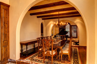 Tuscan dining room photo in Denver