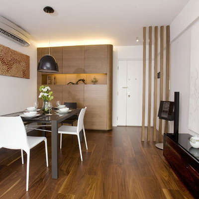 Example of a trendy dining room design in Hong Kong with white walls