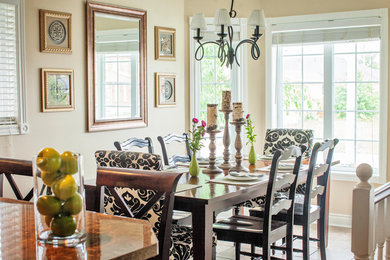 Transitional dining room photo in Toronto