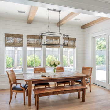 Open Dining Room with Exposed Beams and Views of the Pool