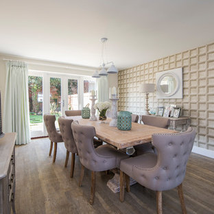 This is an example of a medium sized classic enclosed dining room in Buckinghamshire with beige walls, medium hardwood flooring and brown floors.
