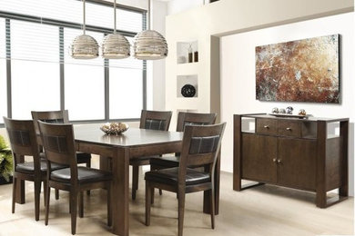 Example of a mid-sized trendy light wood floor enclosed dining room design in Calgary with beige walls