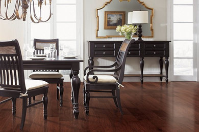 Photo of a medium sized traditional open plan dining room in Other with white walls, dark hardwood flooring and no fireplace.