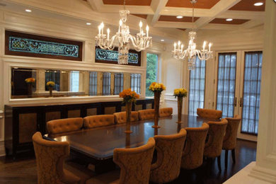 Large elegant dark wood floor kitchen/dining room combo photo in New York with beige walls