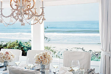 Example of a mid-sized beach style enclosed dining room design in Miami with gray walls and no fireplace