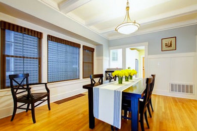 Inspiration for a mid-sized medium tone wood floor dining room remodel in DC Metro with blue walls