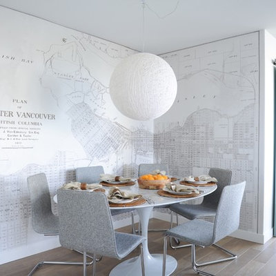 Dining room - scandinavian light wood floor dining room idea in Vancouver with multicolored walls