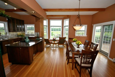 Example of an arts and crafts dining room design in Milwaukee