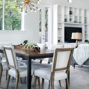 Great room - large contemporary concrete floor and gray floor great room idea in Austin with white walls and no fireplace