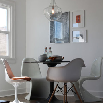 Panton, Saarinen and Eames Chairs with Saarinen Table and Edison Bulb Pendant