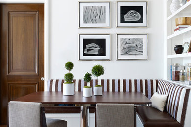 Design ideas for a classic dining room in New York with white walls, dark hardwood flooring and no fireplace.