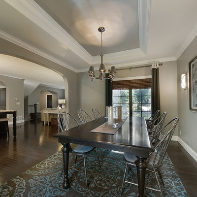 Dining room - traditional dark wood floor dining room idea in Denver with gray walls