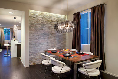 Inspiration for a mid-sized contemporary dark wood floor enclosed dining room remodel in Atlanta with white walls