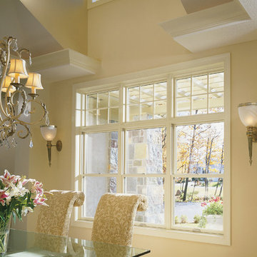 Pella® Architect Series® double-hung and fixed windows lighten up dining areas