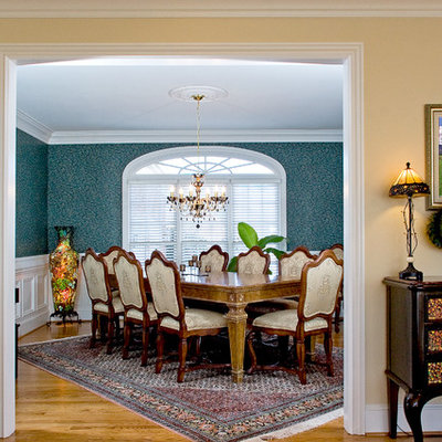 Dining room - traditional medium tone wood floor dining room idea in Other with beige walls