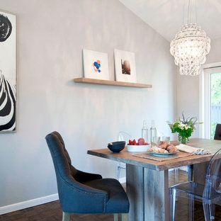 Inspiration for a mid-sized modern dark wood floor and brown floor great room remodel in San Francisco with gray walls and no fireplace