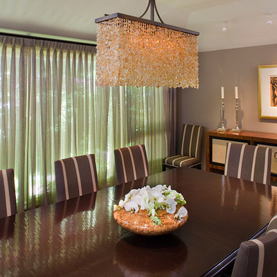 Inspiration for a mid-sized contemporary dark wood floor and brown floor enclosed dining room remodel in San Francisco with beige walls and no fireplace