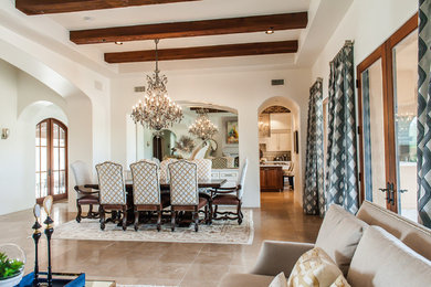 Dining room - large transitional travertine floor dining room idea in Phoenix with white walls