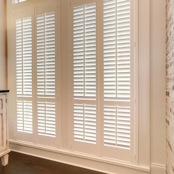 Plantation Shutters and Roman Shades