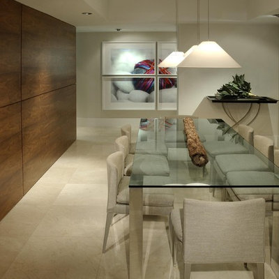 Inspiration for a contemporary dining room remodel in Miami with white walls