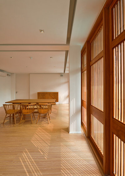 Contemporary Dining Room by Abin Design Studio