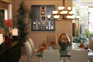 Example of a mid-sized trendy ceramic tile and beige floor enclosed dining room design in Los Angeles with beige walls and no fireplace