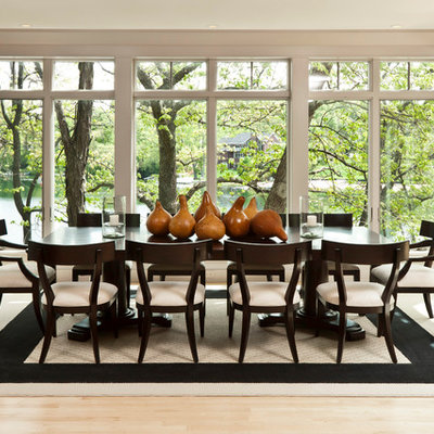 Inspiration for a contemporary light wood floor dining room remodel in Milwaukee