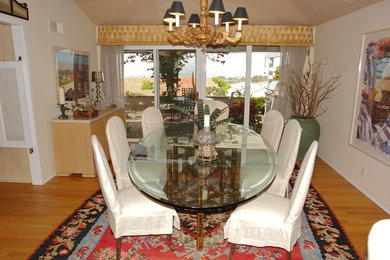 Example of a classic dining room design in Orange County