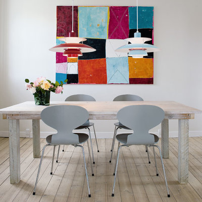 Inspiration for a contemporary dining room remodel in Sydney with white walls