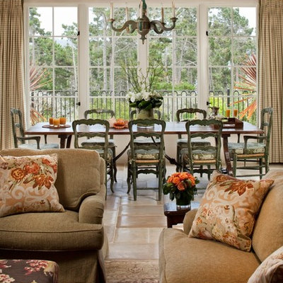 Great room - mid-sized mediterranean ceramic tile great room idea in Other with white walls and no fireplace