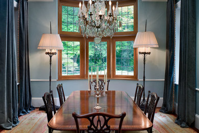 Inspiration for a timeless dining room remodel in Atlanta with blue walls and no fireplace