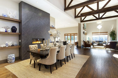 Great room - large traditional dark wood floor great room idea in Los Angeles with beige walls, a ribbon fireplace and a tile fireplace