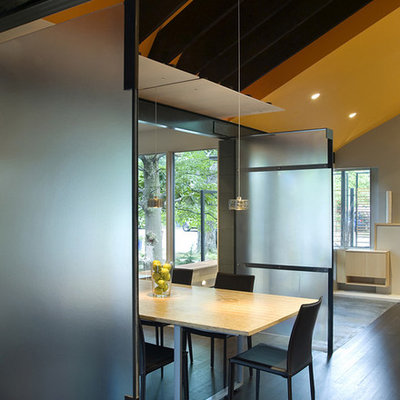 Example of a trendy dark wood floor dining room design in DC Metro